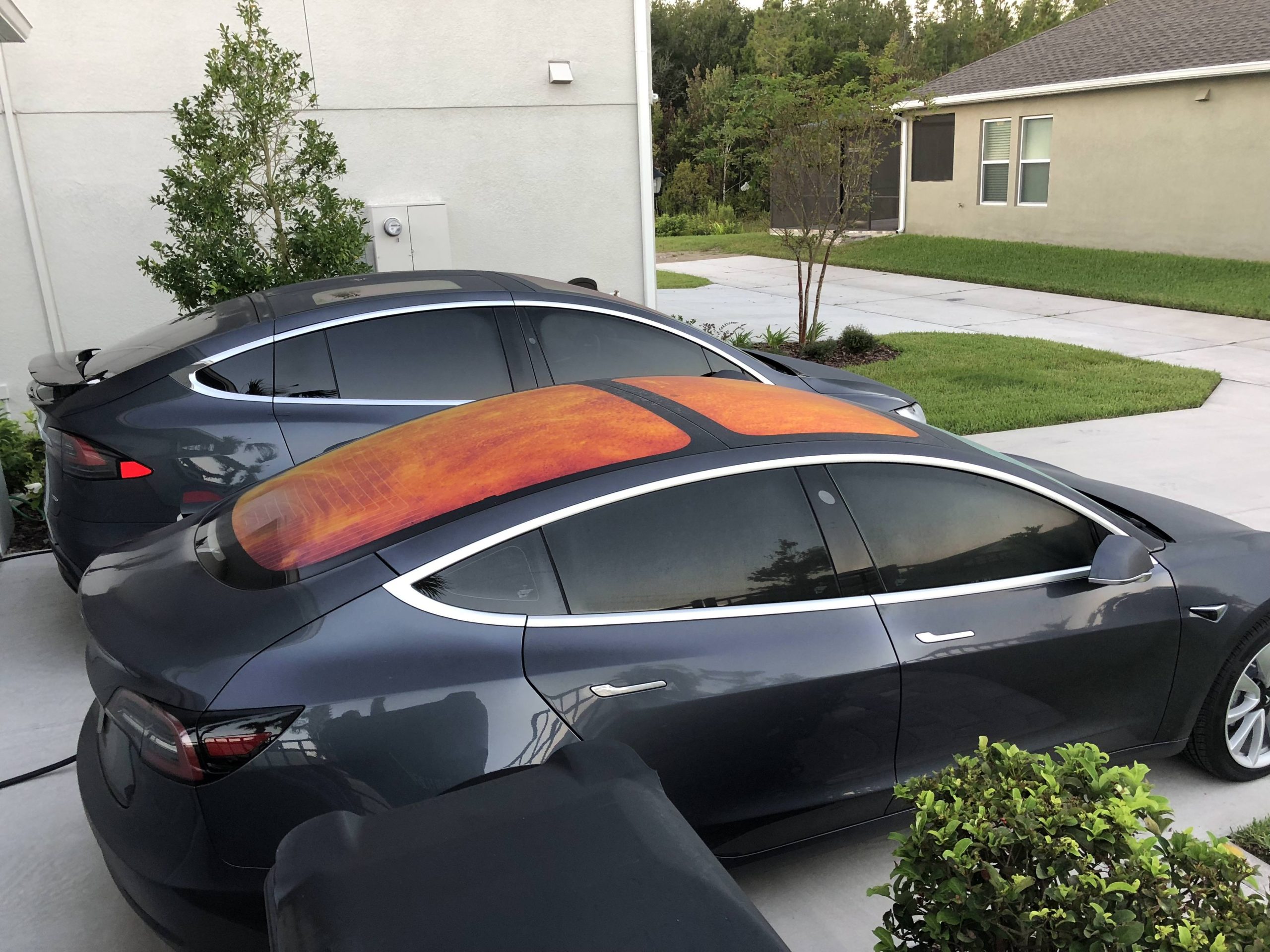 Why Does The Roof of My Tesla Appear Orange-Red? – Adonis Automotive